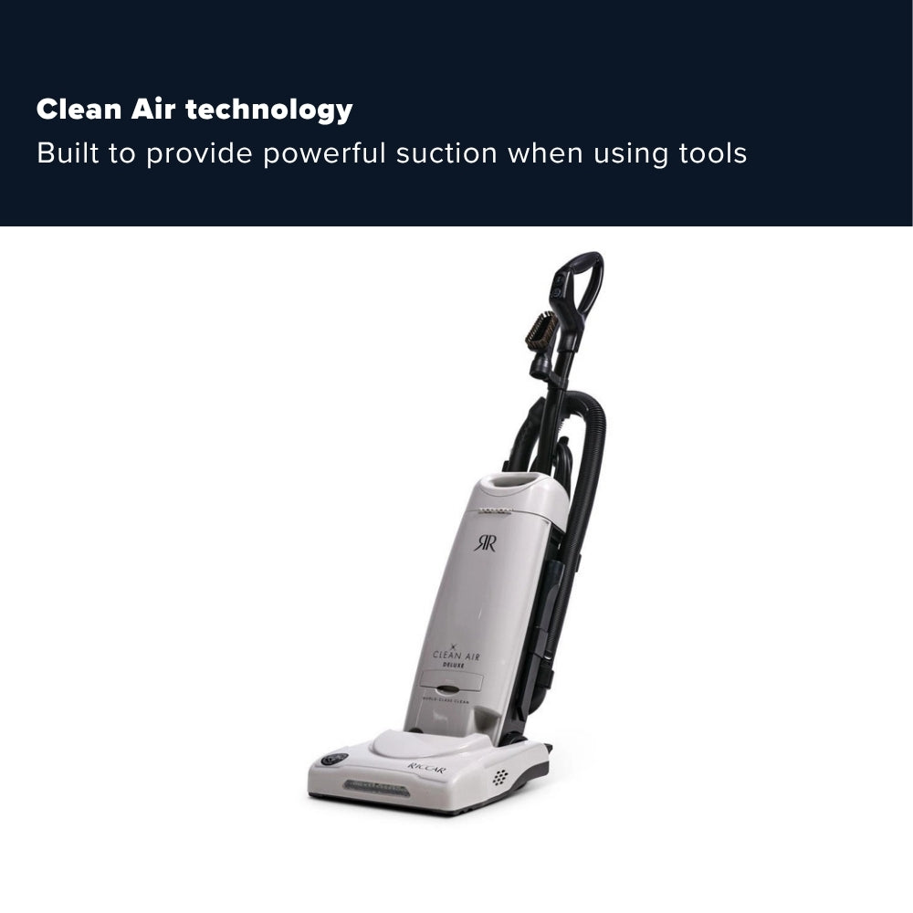 A riccar upright vacuum cleaner in light gray and black, shown on a white background with a dark navy banner at the top containing the text 'Clean Air technology Built to provide powerful suction when using tools.'.