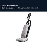 A riccar upright vacuum cleaner in light gray and black, shown on a white background with a dark navy banner at the top containing the text 'Clean Air technology Built to provide powerful suction when using tools.'.